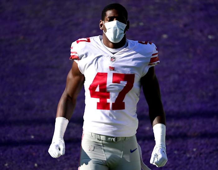 Dec 27, 2020; Baltimore, Maryland, USA; New York Giants linebacker Cam Brown (47) walks on the field prior to the game against the Baltimore Ravens at M&T Bank Stadium.